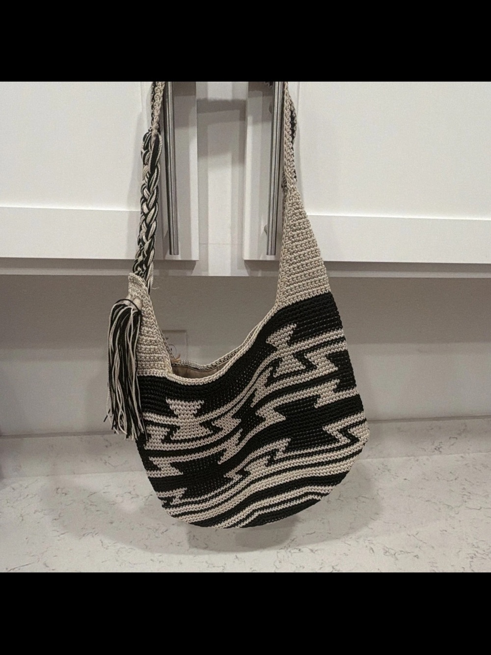 The Sak Back to Bali Handcrafted Black and Cream Crochet Hobo Bag